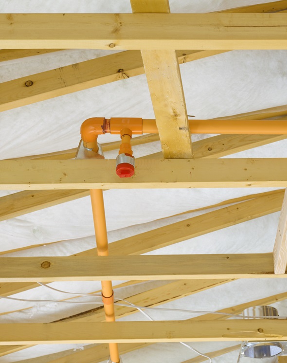 Fire sprinkler system on the exposed beams of a building content-image